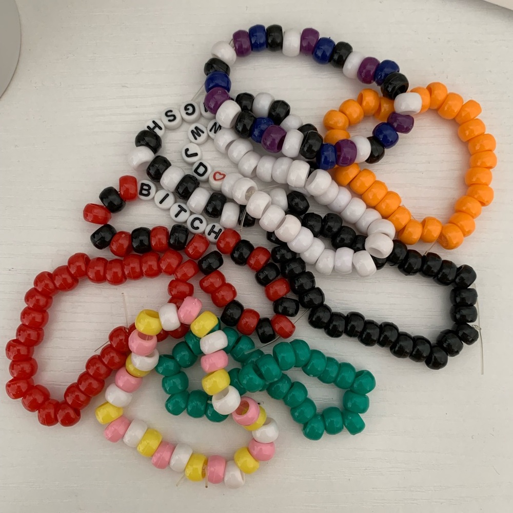 Handmade beaded bracelets, multicolored, one size, all of them sold together.